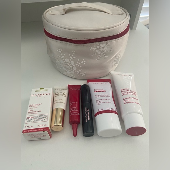NEW Clarins 7 Pieces Skincare Mascara Makeup Travel Kit with Satin Case Carry On - Picture 1 of 12